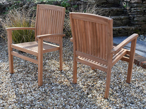 Solid Teak outdoor stacking armchairs, perfect for commercial use. 