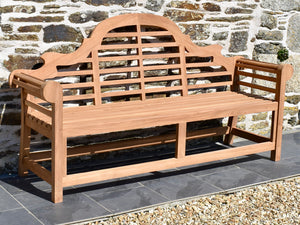 Lutyens style garden bench with traditional lattice design back-rest and scroll style arm-rests