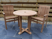 Load image into Gallery viewer, 2 seater round pedestal style teak table and chairs set with stacking garden armchairs