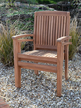 Load image into Gallery viewer, Detail showing 2 teak chairs stacked together.