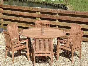 Teak outdoor round, pedestal style dining table with 6 stacking armchairs.