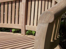 Load image into Gallery viewer, close-up detail of banana bench arm and wood grain