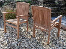 Load image into Gallery viewer, Solid Teak outdoor stacking armchairs, perfect for commercial use. 